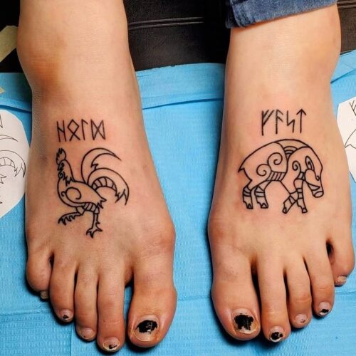 Tattoos on the top of both feet by Chris Dorn at Cactus Tattoo in Mankato