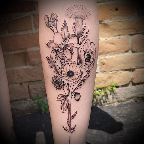 Flower tattoo by Chris Dorn at Cactus Tattoo