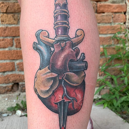 Knife through heart Tattoo by Rob Foster at Cactus Tattoo in Mankato