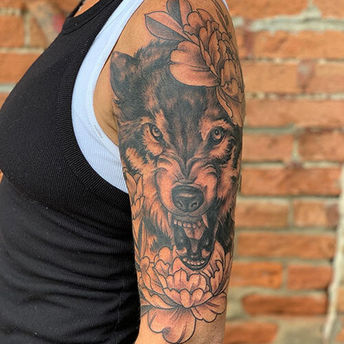 Wolf full sleeve Tattoo by Rob Foster at Cactus Tattoo in Mankato