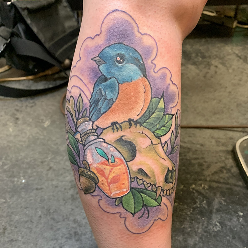 Bird with skull tattoo by Rob Foster at Cactus Tattoo in Mankato MN