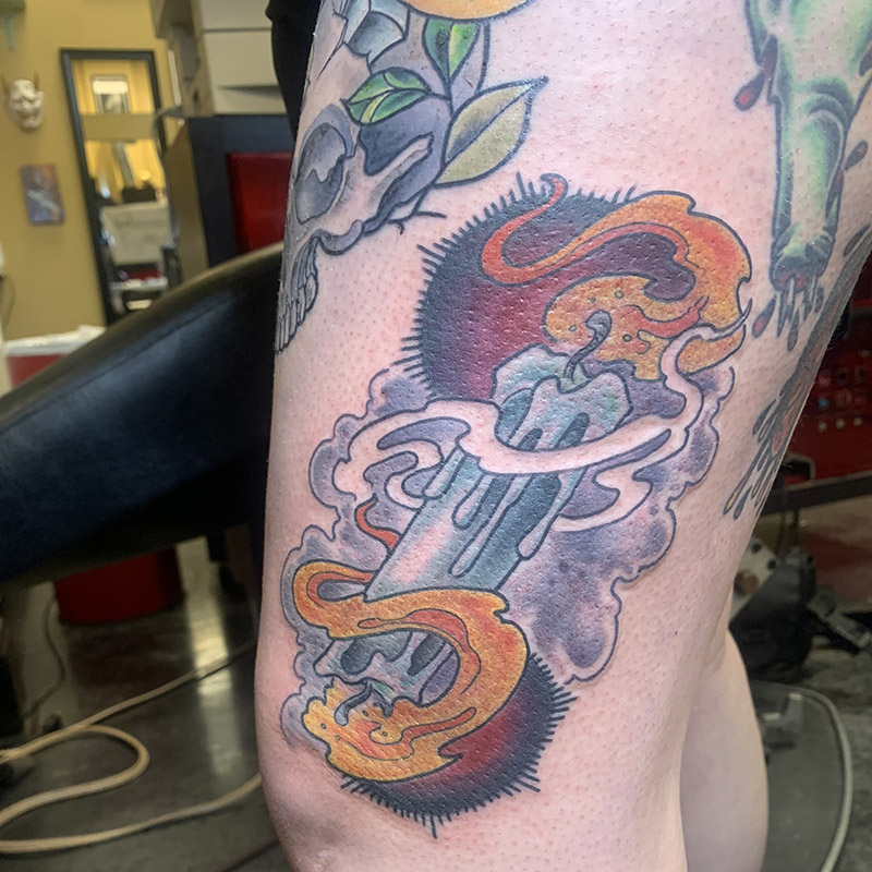 Buring candle tattoo by Rob Foster at Cactus Tattoo in Mankato MN